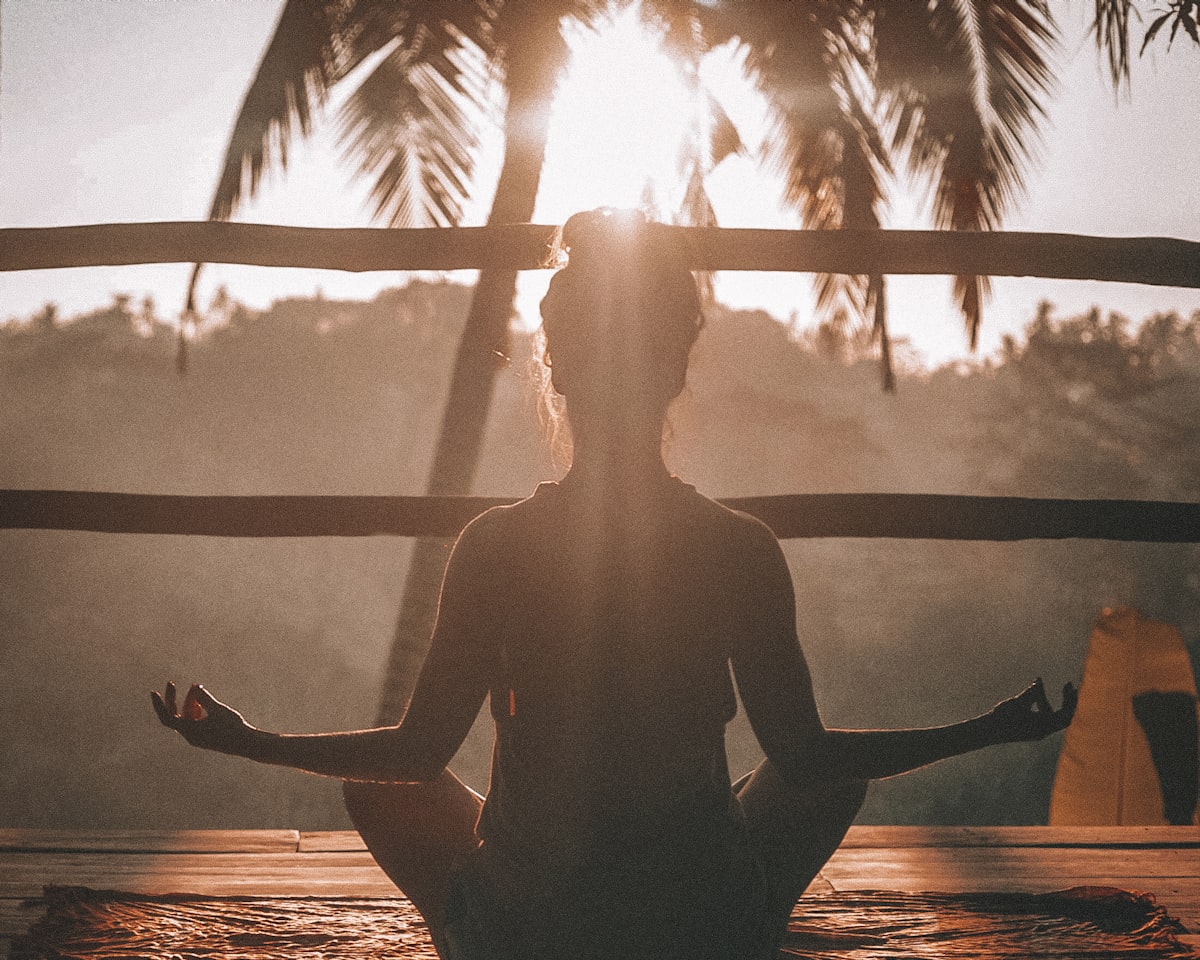 A calm, positive moment of stillness in warm golden light